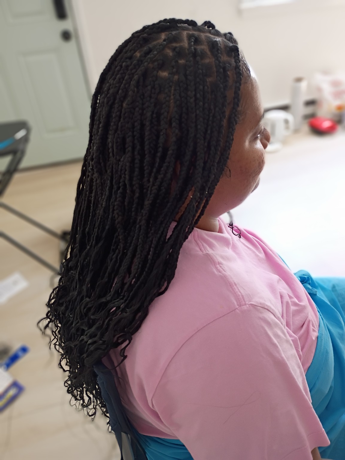 Long neat braids with curled ends